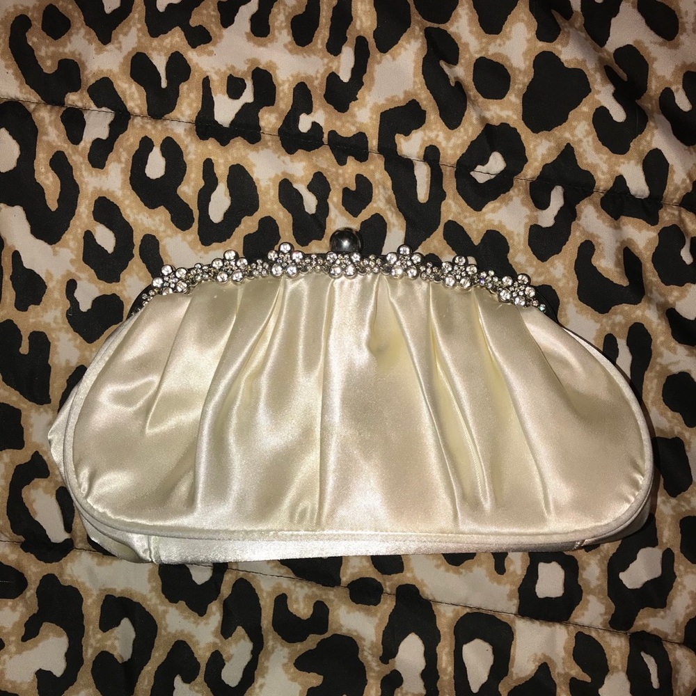 Claire’s clutch handbag